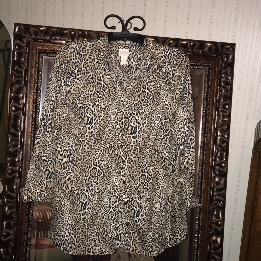 A woman’s leopard shirt